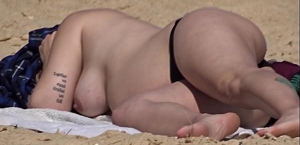  Beautiful busty pregnant topless at the beach